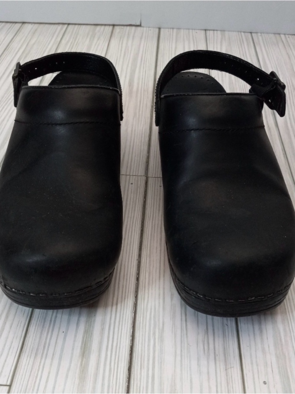 Dansko Kids Black Leather Clogs with Back Strap